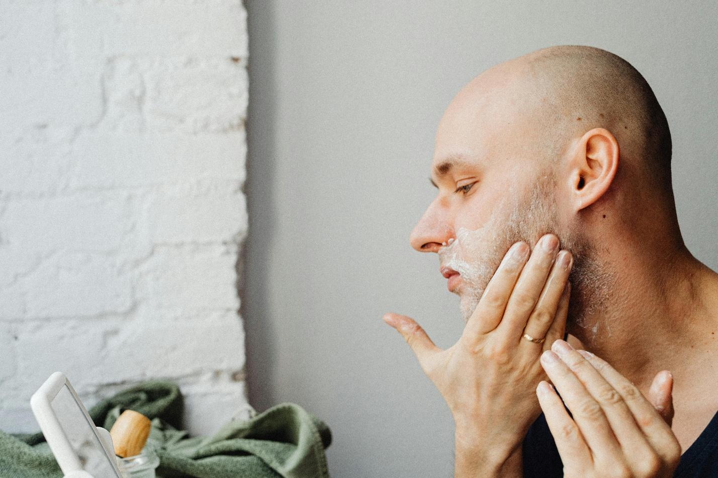 A person using aftershave
